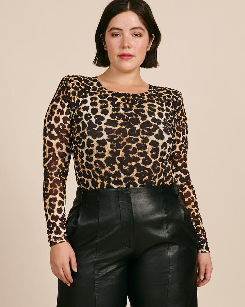 Front of a model wearing a size 5 Mesh Power Bodysuit in Leopard by Good American. | dia_product_style_image_id:226695